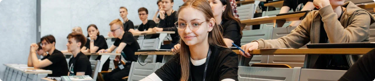 smiling student with glasses
